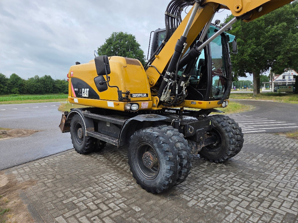 Caterpillar M313D
