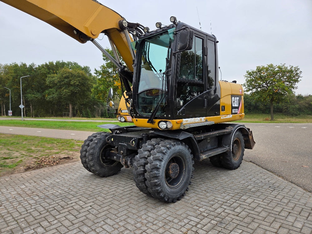 Caterpillar M313D