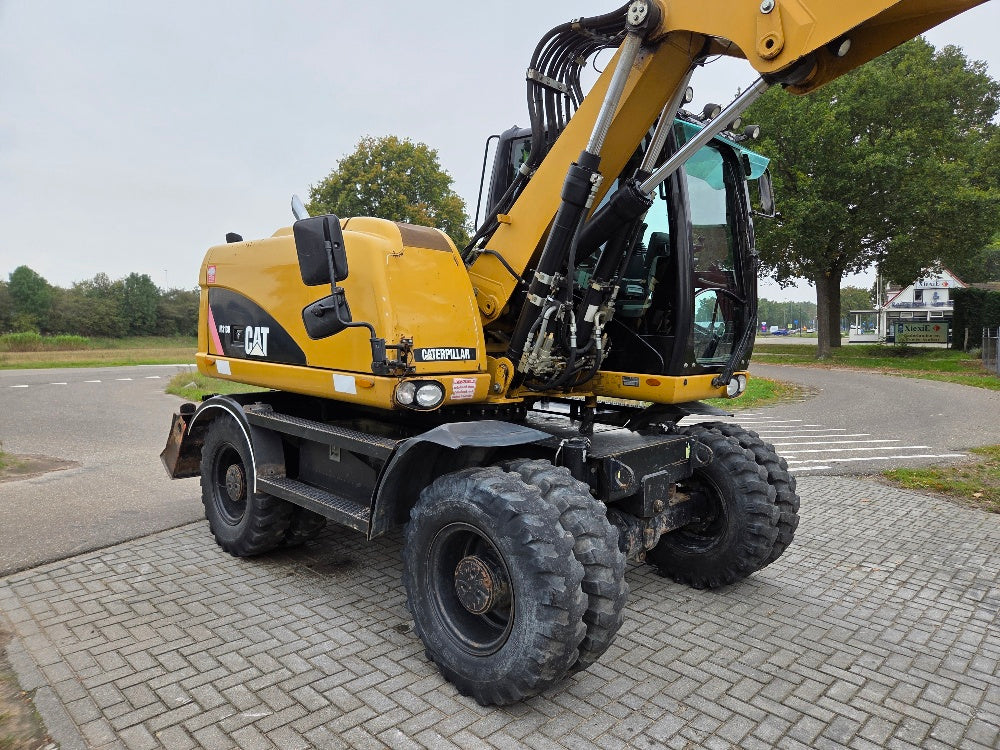 Caterpillar M313D